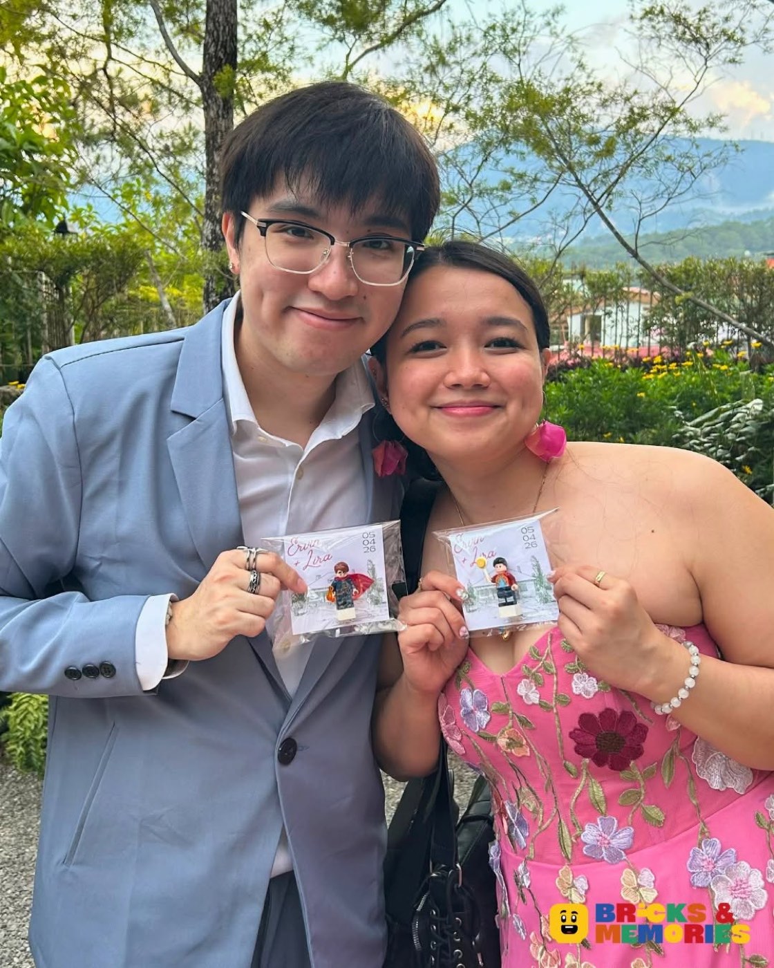 Guests holding personalized minifigure keychain favors